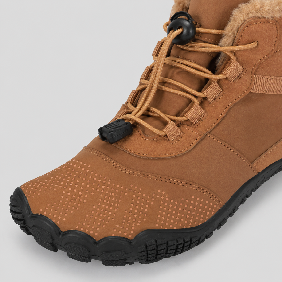 Color: Tan | Detail view of fleece-lined barefoot winter boots